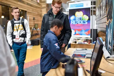 A child playing Bit Heroes Connect at Digifest 2018